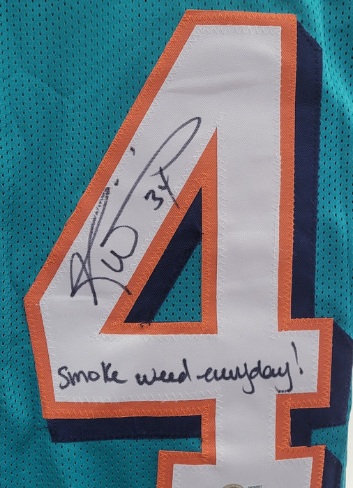 Ricky Williams Signed Turquoise Player Football Jersey w/ Inscription