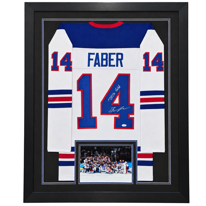 Brock Faber Signed & Professionally Framed White USA Player Hockey Jersey w/ Inscription '2026 Gold!'