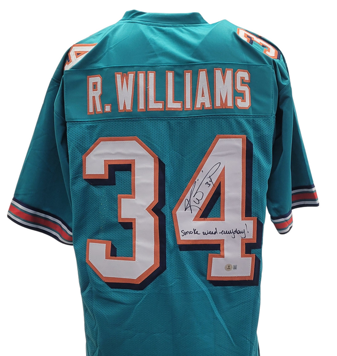 Ricky Williams Signed Turquoise Player Football Jersey w/ Inscription