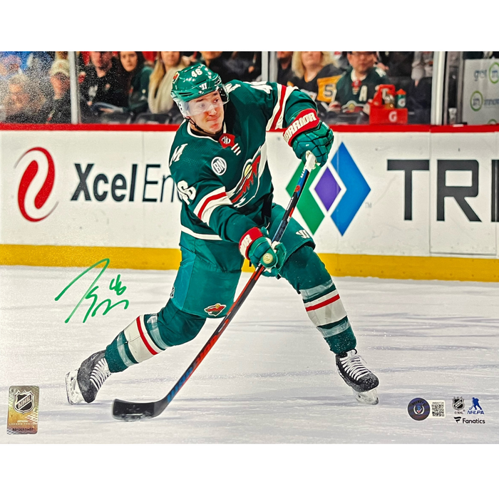 Jared Spurgeon Green Jersey Signed 11x14 Photo