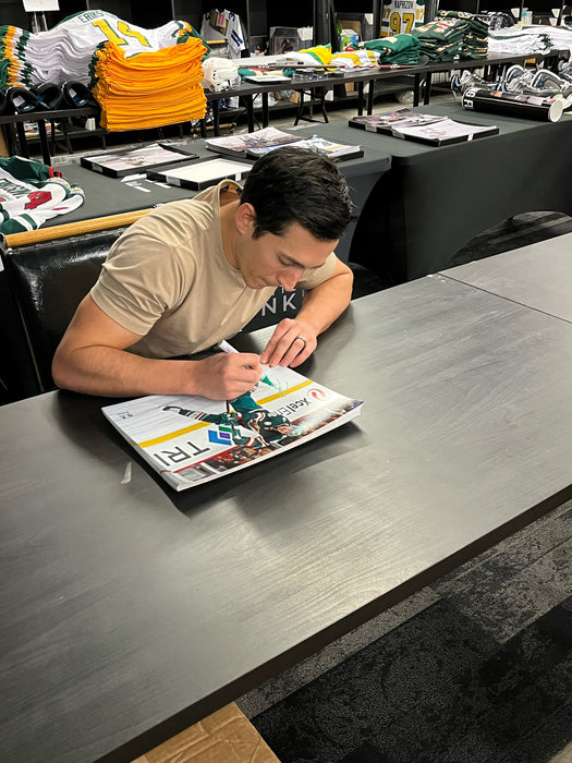 Jared Spurgeon Green Jersey Signed 11x14 Photo