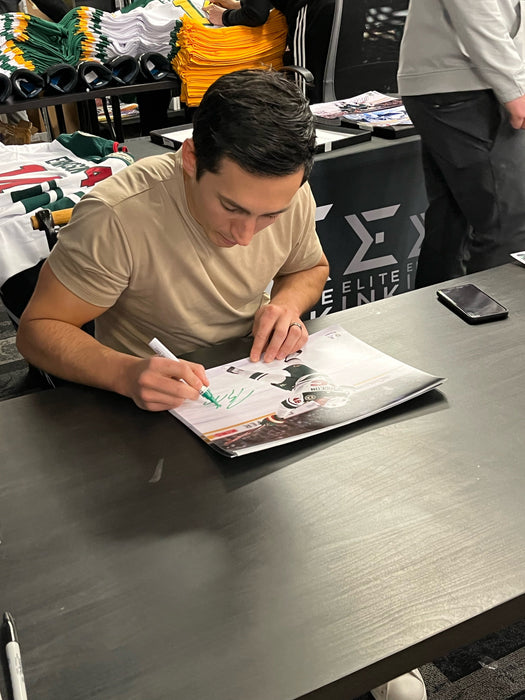 Jared Spurgeon White Jersey Signed 11x14 Photo